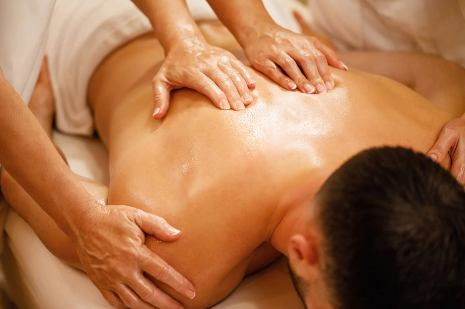 Four-hand erotic massage